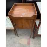 A GEORGE III MAHOGANY BEDSIDE CABINET