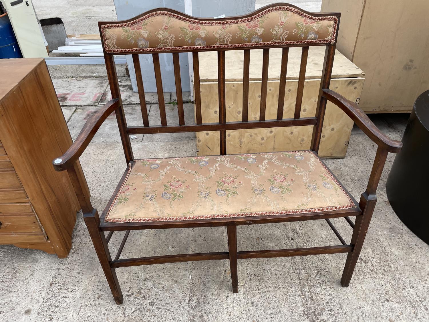 AN EDWARDIAN MAHOGANY AND INLAID PARLOUR SETTEE