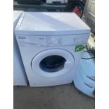 A WHITE PROACTION WASHING MACHINE BELIEVED IN WORKING ORDER BUT NO WARRANTY