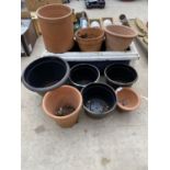 A QUANTITY OF TERRACOTTA GARDEN POTS TO ALSO INCLUDE WOODEN TROUGH AND FURTHER PLANT POTS