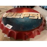 A VINTAGE STYLE RETRO WALL HANGING BOTTLE TOP 'PEPSI' SIGN