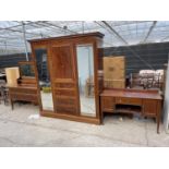 AN EDWARDIAN MAHOGANY AND INLAID THREE PIECE BEDROOM SUITE COMPRISING A DOUBLE MIRROR DOOR WARDROBE,