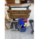 A COLLECTION OF TOOLS TO INCLUDE A WORK BENCH, SPANNERS AND JACK ETC