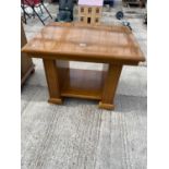 A MODERN MALAYSIAN OCCASIONAL TABLE 30" X 24"