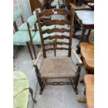 AN 18TH CENTURY LANCASHIRE STYLE RUSH SEATED ROCKING CHAIR