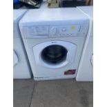 A WHITE HOTPOINT 6KG WASHING MACHINE BELIEVED IN WORKING ORDER BUT NO WARRANTY