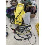 A KARCHER ELECTRIC PRESSURE WASHER BELIEVED IN WORKING ORDER BUT NO WARRANTY