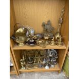 A LARGE QUANTITY OF BRASS ITEMS TO INCLUDE CANDLE STICKS, HANDLES AND POTS ETC