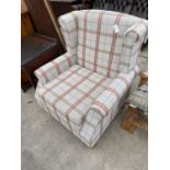 A DUNELM WINGED EASY CHAIR