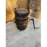 A VINTAGE BUTTER CHURN WITH HANDLE