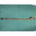 A BIRD'S HEAD (KNOBBLER) KNOB HANDLED WALKING STICK