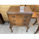 A REPRODUCTION WALNUT CHEST OF THREE DRAWERS ON CABRIOLE LEGS, 20" WIDE