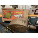 A VINTAGE 'THE STIP MASTER' 35MM FILM STRIP PROJECTOR