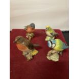 FOUR BESWICK BIRD FIGURINES TO INCLUDE A CHAFFINCH, ROBIN, BLUE TIT AND A GOLDCREST