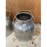 A STAINLESS STEEL MILKING BUCKET