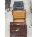 TWO METAL DEED BOXES AND A FURTHER TWO LEATHER BRIEFCASES
