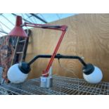 A MID CENTURY VINTAGE TWO ARM ANGLE POISE LAMP WITH A HEAVY METAL BASE TO ALSO INCLUDE A VINTAGE TWO