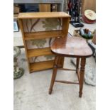 A WOODEN STOOL AND A THREE SHELF WOODEN BOOKCASE