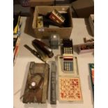 AN ASSORTMENT OF ITEMS TO INCLUDE MODEL OF A TANK, LEAD TRAIN, PENCIL SHARPENER, TRAIN TRACK ETC