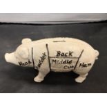 A CAST MONEY BOX ' LIMERICK HAMS IRELAND' IN THE FORM OF A PIG