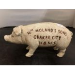 A CAST MONEY BOX IN THE FORM OF A PIG ' WM MOLAND'S SONS ...'