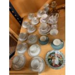 A COLLECTION OF MIXED CERAMICS TO INCLUDE CUPS AND SAUCERS