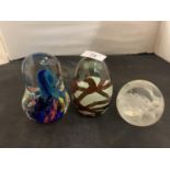 A TRIO OF COLOURFUL GLASS PAPER WEIGHTS