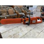 AN ELECTRIC HUSQVARNA 317 CHAINSAW BELIEVED IN WORKING ORDER BUT NO WARRANTY