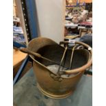 A BRASS COAL BUCKET TO INCLUDE A POKER AND TONGS