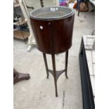 AN EDWARDIAN MAHOGANY AND INLAID PLANT STAND ON OPEN BASE COMPLETE WITH LINER