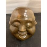 A BRASS FOUR FACE BUDDHA HEAD