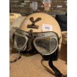 A VINTAGE CENTURIAN MOTORCYCLE HELMET AND ACCOMPANYING GOGGLES