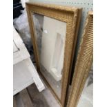 A MODERN GILT FRAMED WALL MIRROR 29.5x42"