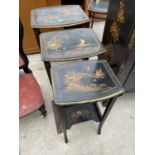 AN EARLY 20TH CENTURY CHINOISERIE NEST OF THREE TABLES