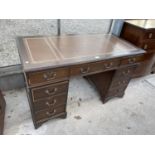 A MODERN MAHOGANY TWIN-PEDESTAL DESK ENCLOSING NINE DRAWERS WITH INSET LEATHER TOP, 48x24"