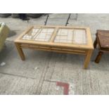 A MODERN OAK COFFEE TABLE 50" X 28"