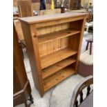 A MODERN OPEN PINE FOUR TIER BOOKCASE, 36" WIDE