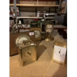 FIVE MANTEL/CARRIAGE CLOCKS, A WHITE METAL CANDELABRA AND A FOLDING TWIN PICTURE FRAME