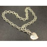 A HEAVY SILVER TIFFANY CHAIN WITH TWO HEARTS MARKED 925
