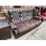 A CHESTERFIELD STYLE BUTTON BACK THREE SEATER SETTEE