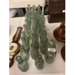 A LARGE QUANTITY OF VINTAGE GLASS BOTTLES