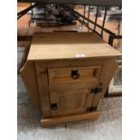 A WOODEN SIDE TABLE/CABINET WITH MAGAZINE RACK