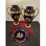 THREE PIECES OF IMPERIA LIMOGES POTTERY TO INCLUDE A PAIR OF URNS AND A PLATE