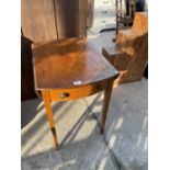 A 19TH CENTURY STYLE OVAL PEMBROKE TABLE ON TAPERED LEGS, WITH SPADE FEET