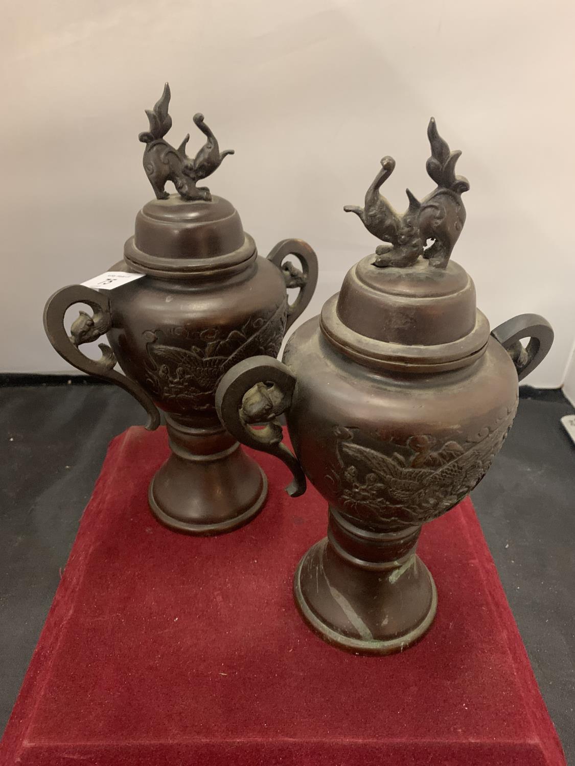 A PAIR OF EARLY BRONZE LIDDED JARS HEIGHT: 26CM