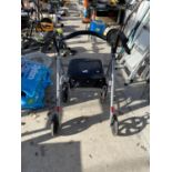 A MOBILITY SEAT AND FRAME WALKER