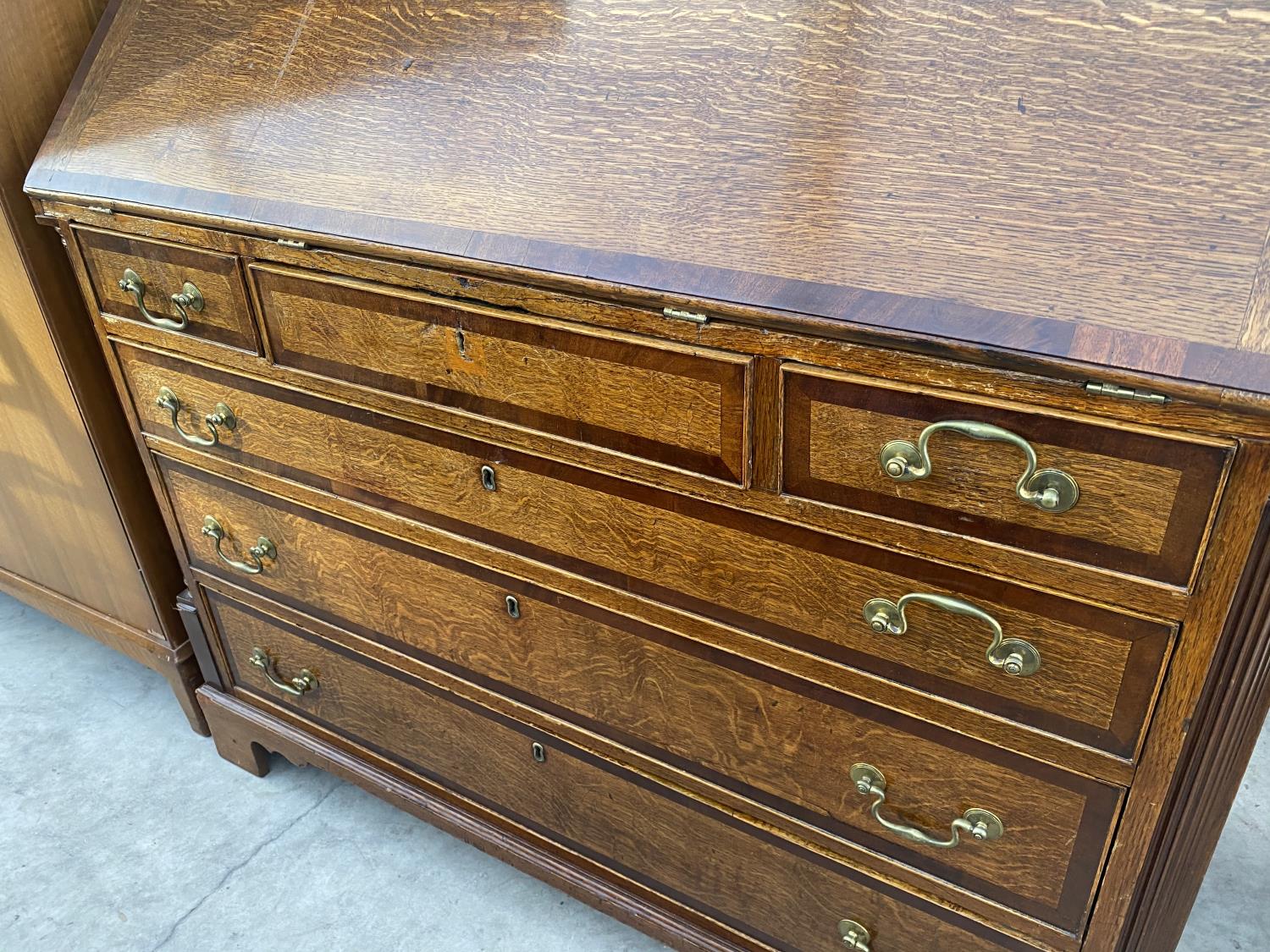 A GEORGE III OAK AND CROSSBANDED FALL FRONT BUREAU WITH FITTED INTERISOR, 45.5" WIDE - Image 3 of 8