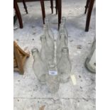 A LARGE COLLECTION OF DECORATIVE GLASS BOTTLES