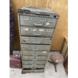 A LARGE VINTAGE METAL NINE DRAWER STORAGE CHEST