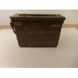A GREEN PAINTED AMMUNITION BOX DATED 1955